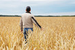 © Alexandr Vasilyev - The man among a wheaten field