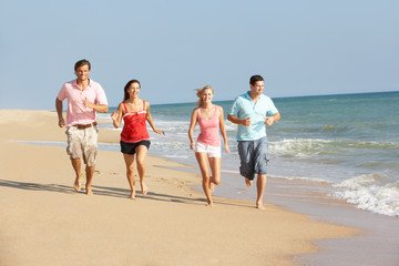 Wall Mural - Group Of Friends Enjoying Beach Holiday