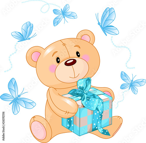 Fototapeta na wymiar Teddy Bear with blue gift