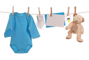 Wall Mural - Baby goods hanging on the clothesline