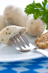 Wall Mural - bavarian white sausages with sweet mustard and parsley