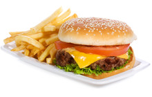 Hamburger With Vegetables And Fries
