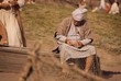 © Image Source - A Fisherman Mending His Nets