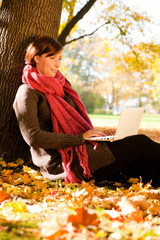 Canvas Print - computer outdoors in autumn