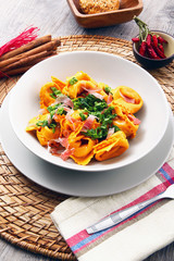 Canvas Print - ravioli di zucca con speck e spinaci