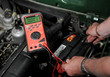 © mrpics - testing a flat car battery 0.01 volts