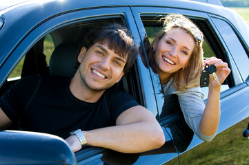 Wall Mural - Happy couple in new car