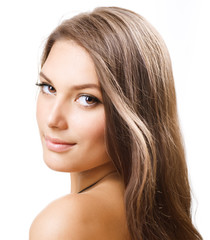 Wall Mural - beautiful girl with long hair. portrait over white.perfect skin