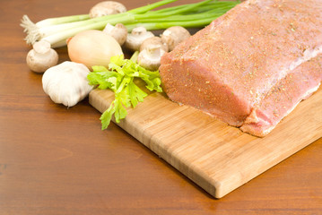 Pork tenderloin prepared for cooking