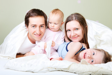 Wall Mural - Happy family at bedroom