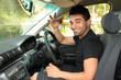 © Leah-Anne Thompson - Happy male driver holding car keys