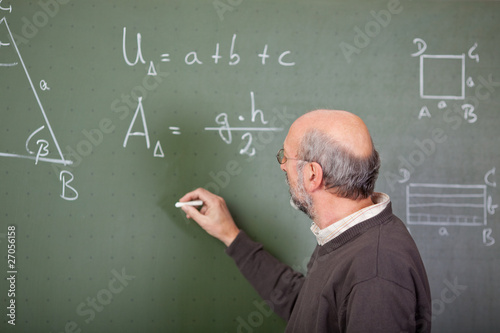 Lehrer Schreibt An Die Tafel Buy This Stock Photo And Explore