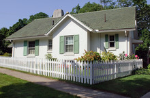 Cottage With Picket Fence