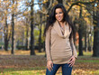 © Dash - Beautiful woman spending time in park during autumn season