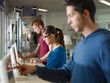 © Diego Cervo - people using pc in library