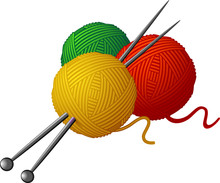 Skeins Of Wool And Knitting Needles