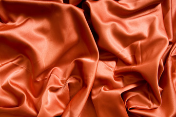 Bright satin fabric folded to be used as background