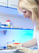 © lightpoet - portrait of a female researcher doing research in a lab (color t
