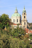 Fototapeta Big Ben - View on the autumn Prague St. Nicholas' Cathedral