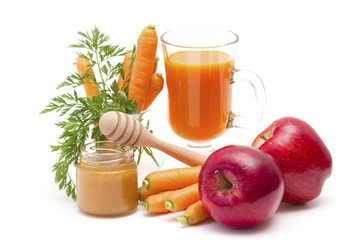 Canvas Print - glass of fresh carrots juice with apple and honey