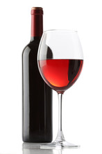 Glass Of Red Wine And A Bottle Isolated Over White Background