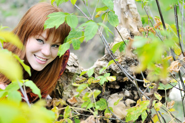 redheaded girl in forest