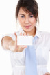 © Arto - Young executive showing her name card