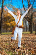 © Aleksandar Todorovic - Happy  woman in the autumn colored park .