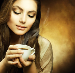 Beautiful Woman with cup of Coffee