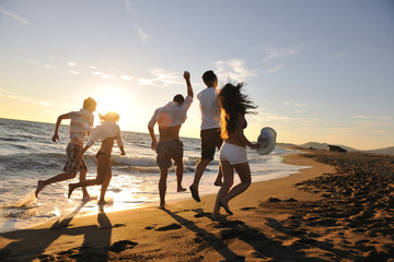 people group running on the beach