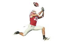 Football Player Catches Ball In Midair
