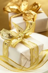 gift boxes with gold ribbon