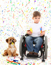 Boy Child Painting Wheelchair With Dog