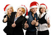 © Acronym - Four young and smart business persons in Christmas hats