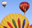 Multicolor hot air balloons with blue sky background