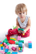 © Elisanth - Little boy playing with colorful blocks