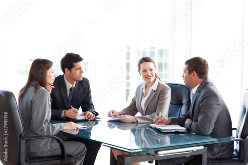 Fotografie, Obraz Businessmen and businesswomen talking during a meeting