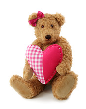 Teddy Bear With Red Heart Isolated On White Background