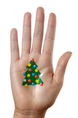 Wall Mural - Christmas tree pattern on a hand