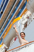Smiling Girl On Ladder Goes To Cruise Ship