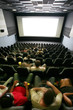 Unrecognizable people in a cinema