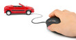 Hand with computer mouse and car