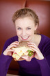 © contrastwerkstatt - blonde frau mit riesigem brot