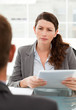 © WavebreakMediaMicro - Serious businesswoman questionning a man during a meeting