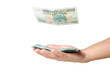 Money rain - banknotes falling from sky to female hand