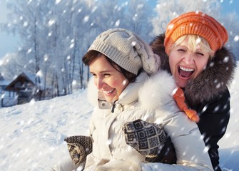 mother and daughter having fun outdoors