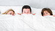 © ongap - man lying with two girls