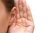 Fototapeta  - Girl listening with her hand on an ear