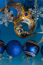 New Year's And Christmas Ornaments And A Carnival A Mask