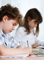 Girl and boy learning